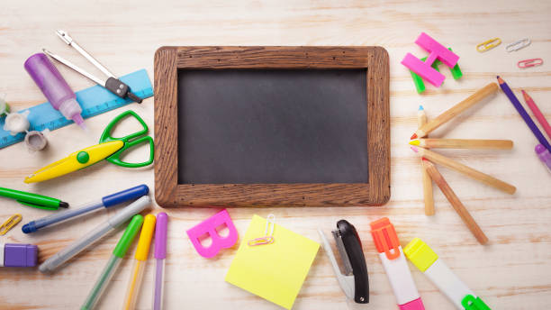 istock set of stationery frame on wood table 698485266
