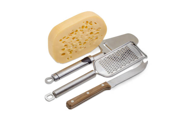 istock Cheese knife, cheese slicer, cheese grater and semi-hard cheese 698491600
