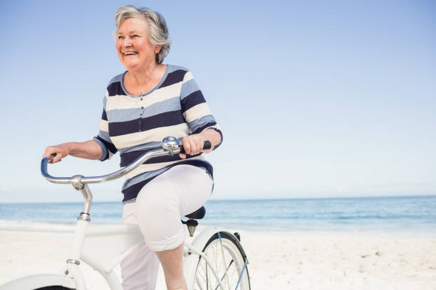 istock Senior woman on a bike 698501048