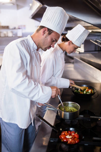 istock Chef preparing food in the kitche 698507954