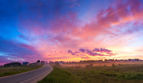 istock rural landscape with sunrise,blue sky and clouds panorama. 698508004
