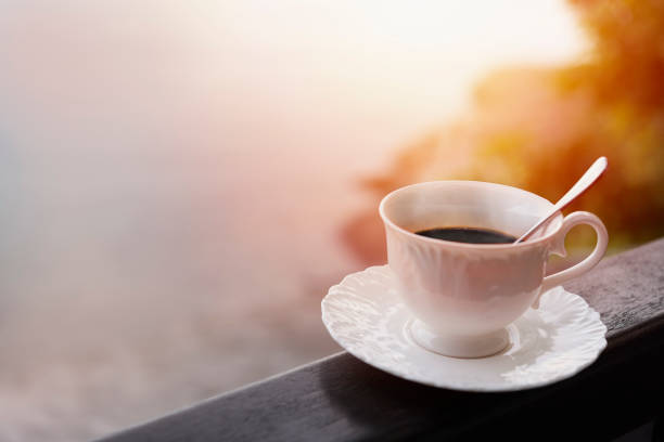 istock Morning coffee at balcony with sun rise and sun ray 698508964