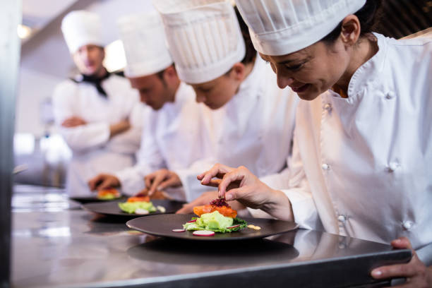 istock Chef decorating a food plate 698509566