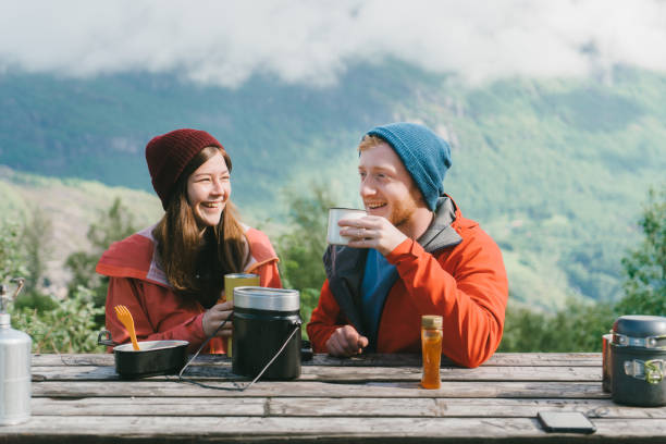 istock Couple have breakfast in mountains in Norway 698525546