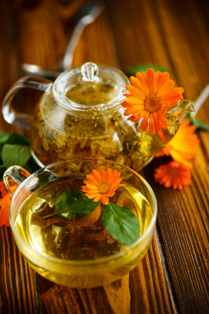 istock Therapeutic tea from flowers of calendula 698528746