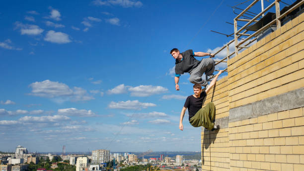 istock The group of roofer rises to the roof 698529288