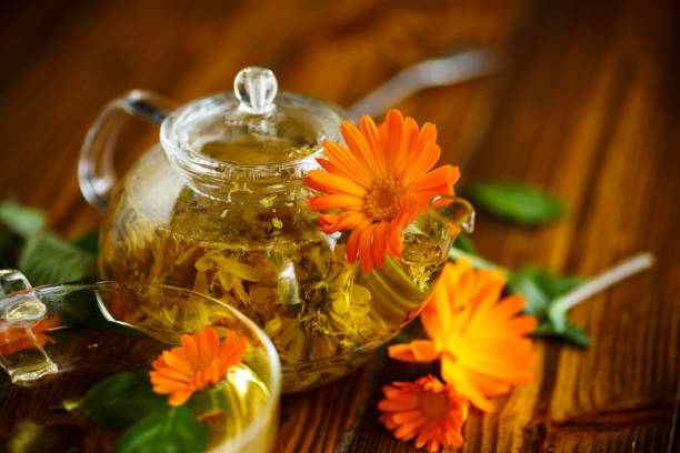 istock Therapeutic tea from flowers of calendula 698529318