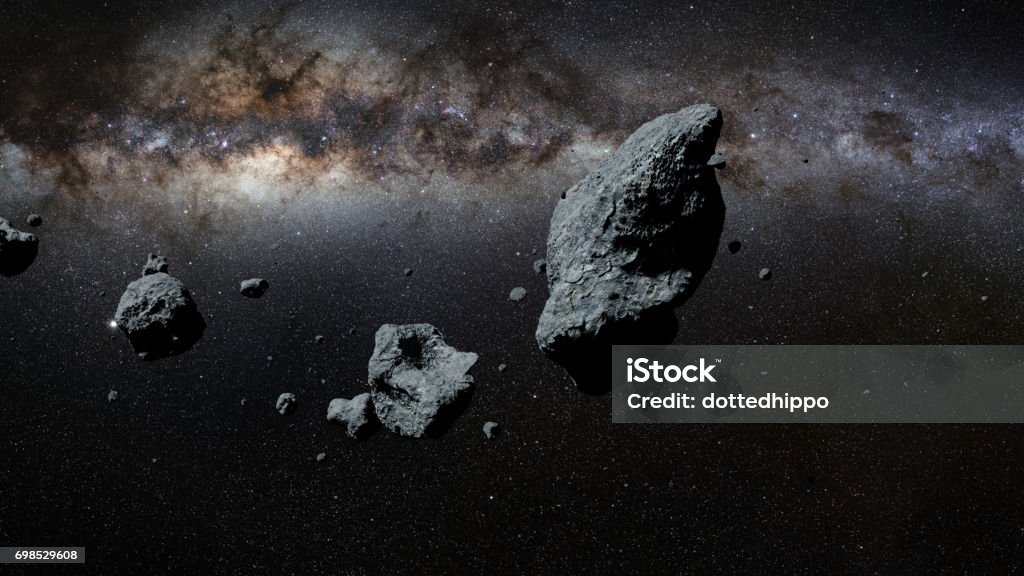 a swarm of asteroids in front of the Milky Way galaxy (3d illustration, elements of this image are furnished by NASA) Asteroid Stock Photo