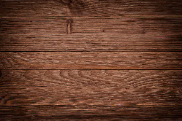 istock Overhead view of wooden table, background texture 698541052