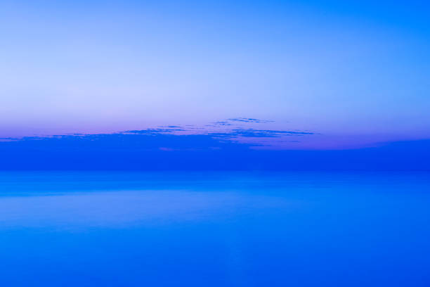 istock Vibrant seascape at Sunrise background 698558530