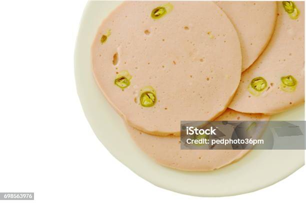 Bologna De Cerdo Relleno De Chili En Plato Foto de stock y más banco de imágenes de Alimento - Alimento, Alimento conservado, Carne