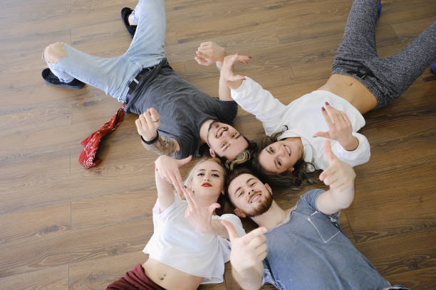 istock Cheerful group of friends having fun together 698572000