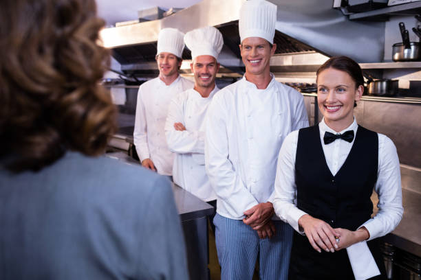 istock Restaurant manager briefing to his kitchen staff 698579978