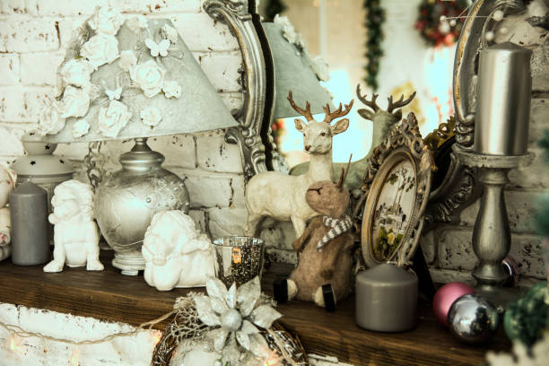 istock Shelf with mirror lamp candles, angels 698584662