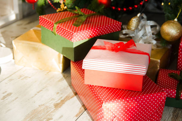 istock Red boxes packed with Christmas gifts 698584722