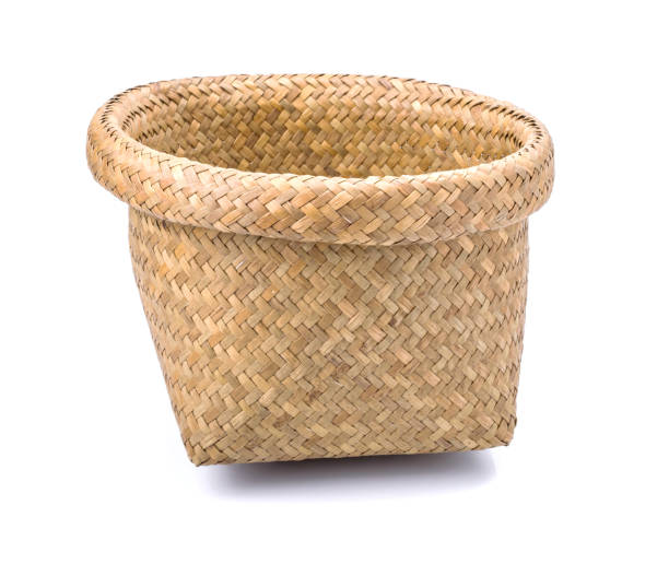 istock Wooden wicker basket over white background 698591566