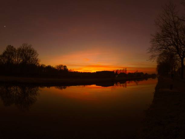 istock Countryside landscape, sunset over the river 698594376