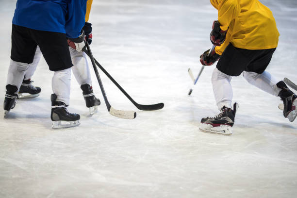 istock Unrecognizable ice hockey player tackling his rivals on a match. 698594962