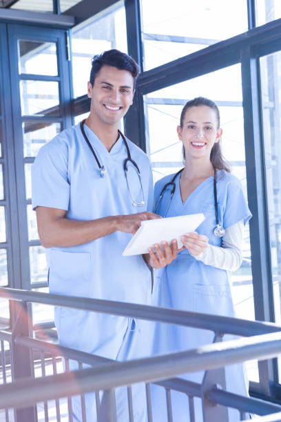 istock Medical team talking at the hospital 698598718