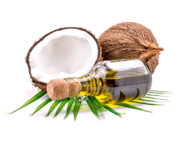白い背景に代替療法のためのココナッツ オイル。 - aromatherapy oil massage oil alternative therapy massaging ストックフォトと画像