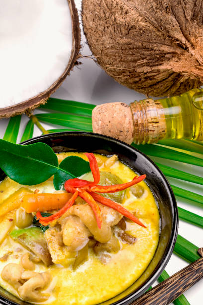istock Hot coconut chicken soup with chili and curry In a bowl 698602320