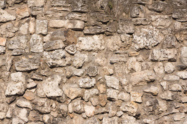istock Stone wall of old medieval castle 698605336