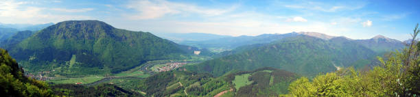 istock spectacular panorama with mountains, river and blue sky with clouds during hiking to Sip hill in Velka Fatra mountains in Slovakia 698609326