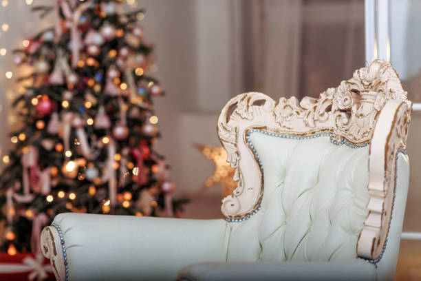 istock Christmas Tree and Christmas gift boxes in the interior with a fireplace. 698614854