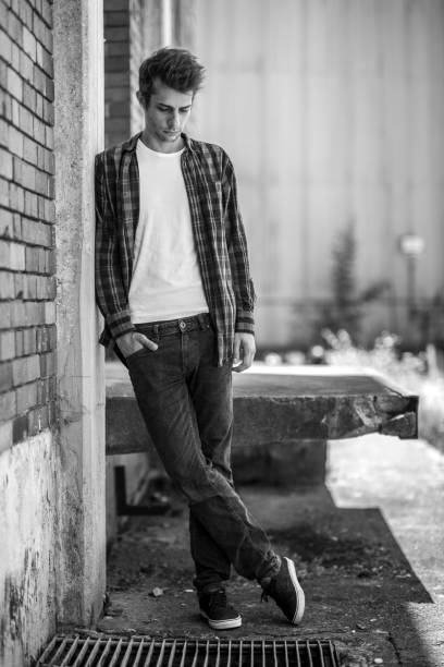 istock serious young man black&white portrait 698615092