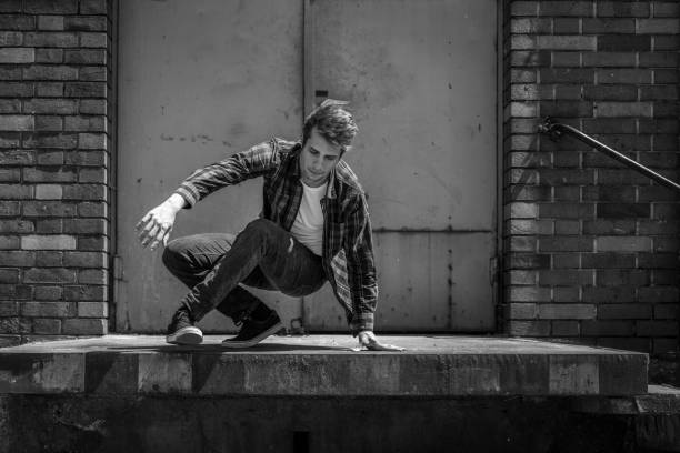 istock young man jumping from the ramp of warehouse 698615100