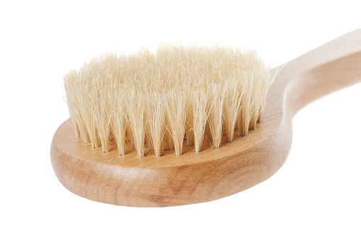 natural brush for washing in bathroom isolated on white background