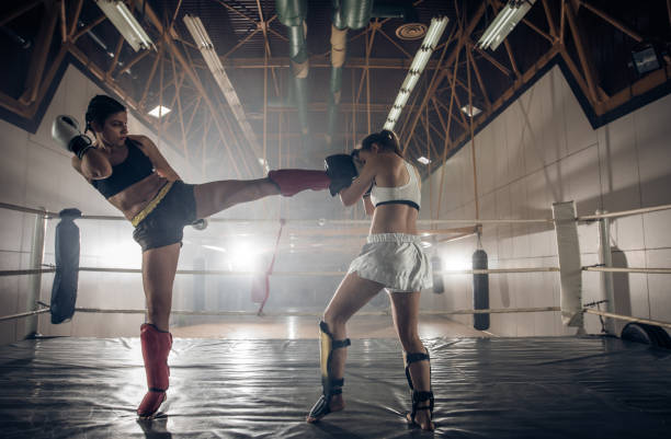 istock Women's fight in a boxing ring! 698621254