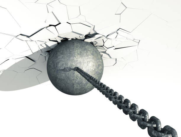 istock Metallic Wrecking Ball Shattering White Wall. Top view. 698622488