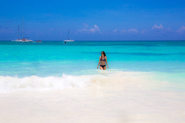 istock Cute woman relax on the summer beach 698629542