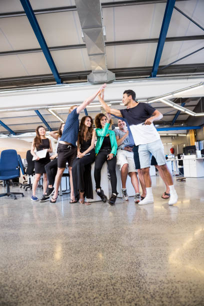 istock Group of businesspeople interacting during break time 698634488