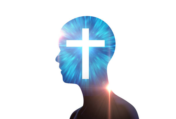 istock white light cross on silhouette of virtual human. 698647760