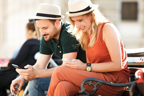 istock Love Couple in the City Using Cellphone 698652906