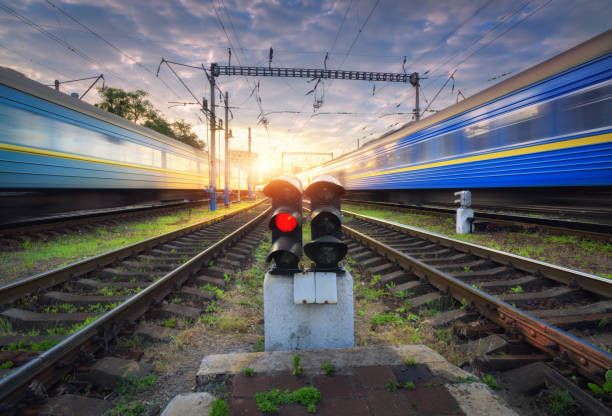 istock High speed passenger trains in motion on railroad track 698673384