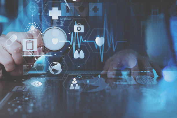istock smart doctor hand working with modern laptop computer in modern office with virtual icon diagram 698677744