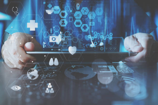 istock smart doctor hand working with modern laptop computer in modern office with virtual icon diagram 698677762