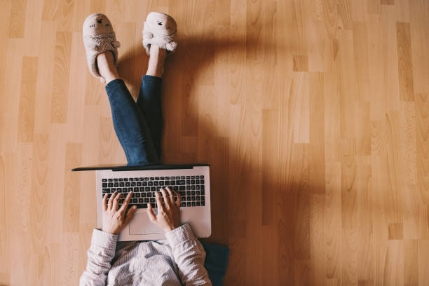istock Modern workspace - girl with laptop working 698683862