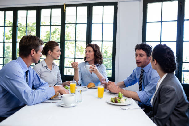 istock Business people having a meeting in restaurant 698687854