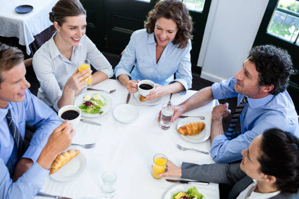 istock Business people having a meeting in restaurant 698689066