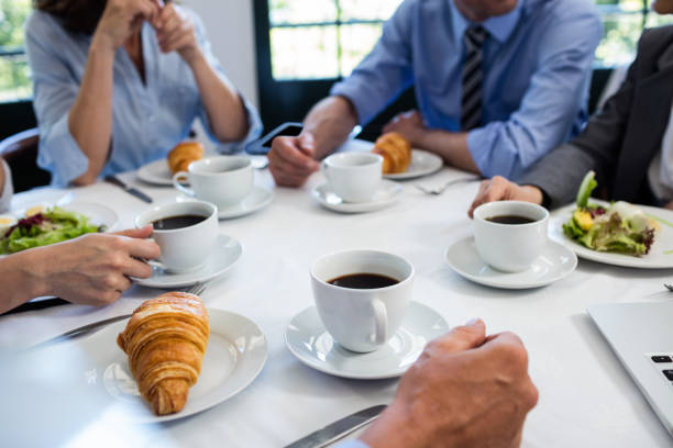 istock Business people having a meeting in restaurant 698689340