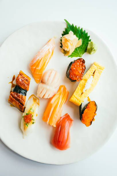 istock Raw and fresh nigiri sushi set in white plate 698701394