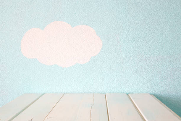 empty table and blue wall - baby goods imagens e fotografias de stock