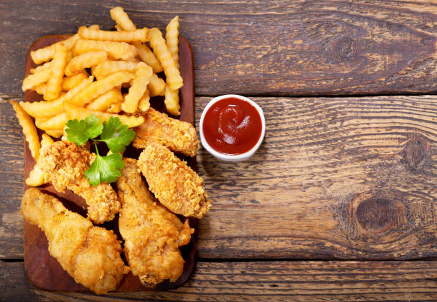 istock fried chicken and french fries 698717872