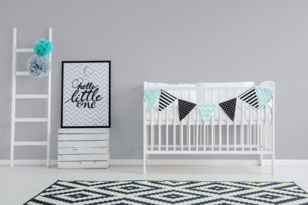istock Grey wall in baby room 698723962