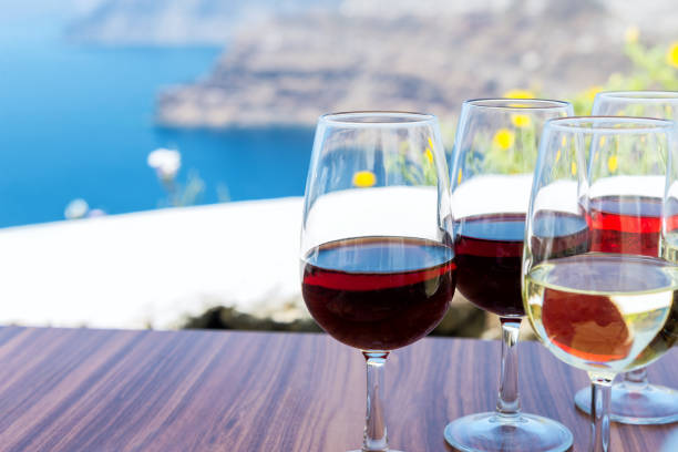 Variation of Greek wines Horizontal color close-up image of greek wines. Tasting red, white and rose wine. table ledge stock pictures, royalty-free photos & images