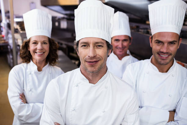 istock Portrait of smiling chef 698732952